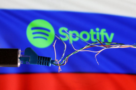 Broken Ethernet cable is seen in front of Russian flag and Spotify logo in this illustration taken March 11, 2022. 