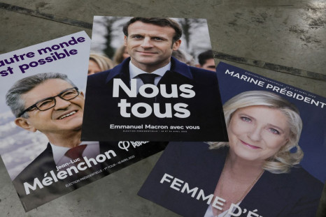 Official campaign posters of French President and centrist LREM party candidate for re-election,  Emmanuel Macron, Marine Le Pen, leader of French far-right National Rally (Rassemblement National) party, and Jean-Luc Melenchon, leader of the far-left oppo