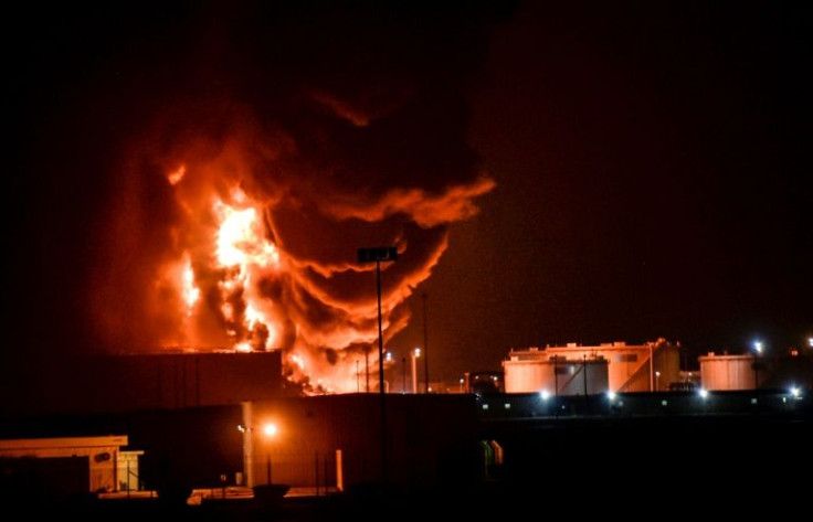 Huge flames rise from the storage tanks of the Saudi Aramco oil facility in Jeddah after it was hit in an attack claimed by Yemeni rebels