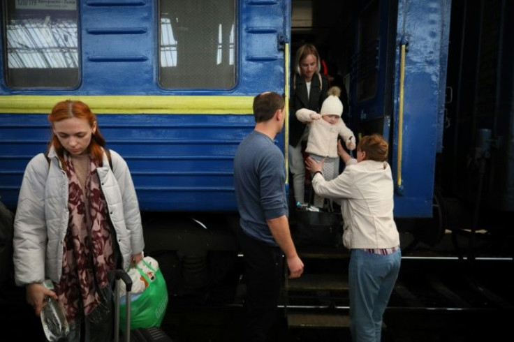 Evacuees from Mariupol arrive by train in the western Ukrainian city of Lviv