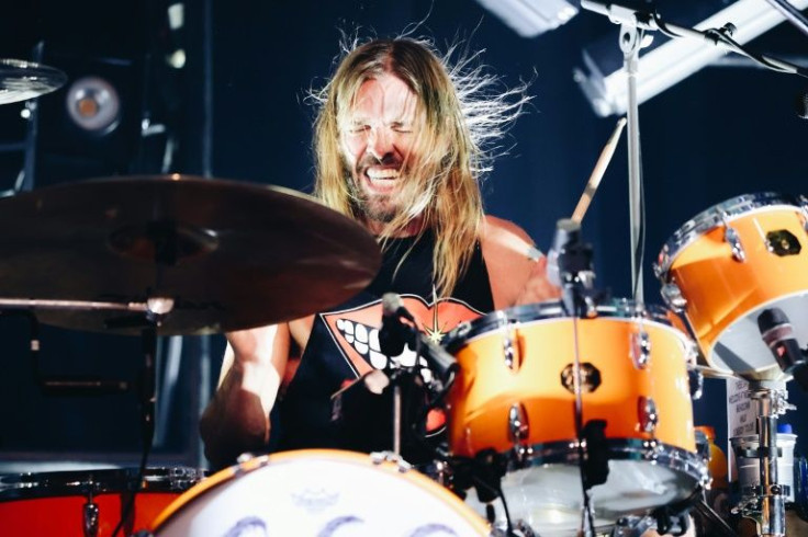 Taylor Hawkins of the Foo Fighters has died at 50, his bandmates said