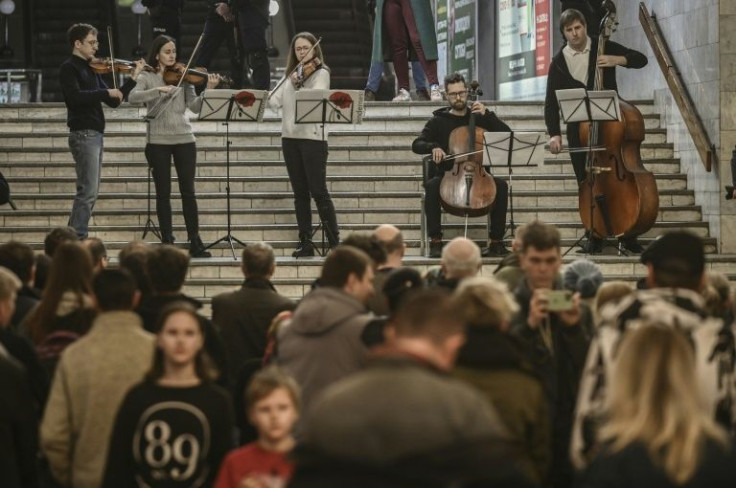 Three violinists, a cellist and a bass player delighted an audience of a few dozen people for half an hour in one of the largest subway stations in Ukraine's second city, close to the Russian border