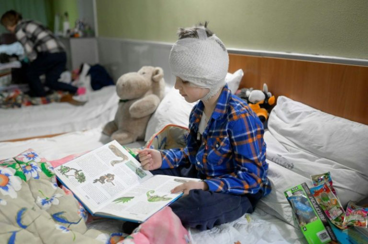 Micha, five, at a hospital in Mykolaiv, lost his mother in a Russian strike