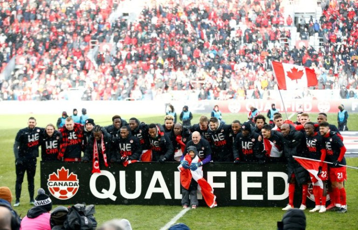 Canada celebrates qualifying for the World Cup for the first time since 1986 after Sunday's 4-0 win over Jamaica