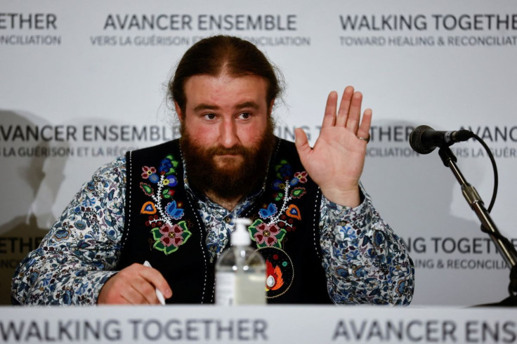 Community-based historian, educator and Region 4 Councillor for the Metis Nation of Ontario, Mitchell Case gestures during a media conference after Indigenous delegates from Canada met with Pope Francis at the Vatican, March 28, 2022.