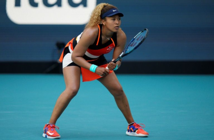 Naomi Osaka of Japan eased into the quarter-finals of the Miami Open with a straight sets win over Alison Riske