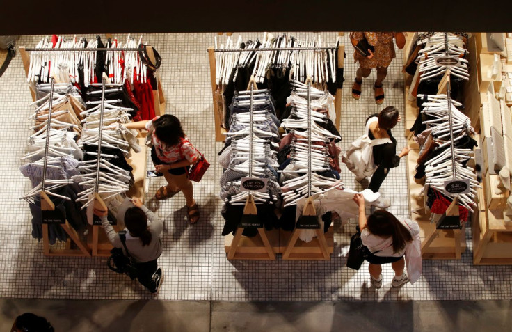 Women shop for clothes on a store in a shopping mall in Sydney's central business district (CBD) Australia, February 5, 2018. 