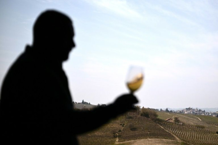 An employee contemplates a glass of Moscato -- while pondering the crippling effect that sanctions on Russia owing to the Ukraine war are already having on business