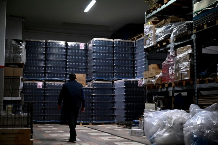 Bottles of Asti Spumante are piled up in a storage warehouse at Castiglione Tinella in northwestern Italy -- but war in Ukraine means looking further afield for exports