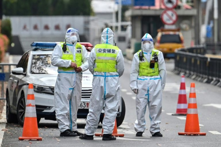 The eastern half of Shanghai was placed in lockdown on Monday as coronavirus cases in the city swelled