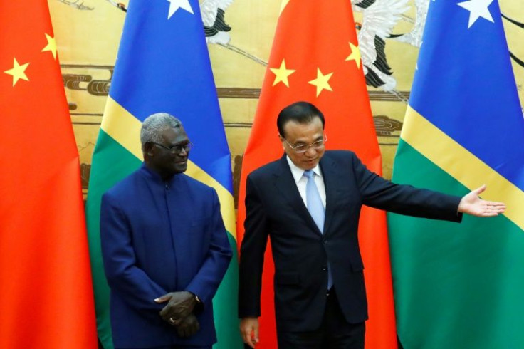 Solomon Islands Prime Minister Manasseh Sogavare (L) has rebuffed fears that a leaked security pact with China would "destabilise" the region