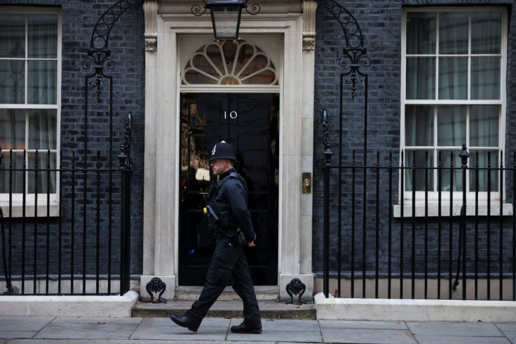 A police officer walks outside Downing Street in London, Britain, January 31, 2022. 