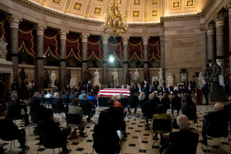 U.S. Sen. Dan Sullivan (R-Alaska) gives a remembrance of Rep. Don Young (R-Alaska) as he lies in state in Statuary Hall at the U.S. Capitol in Washington, DC, U.S., March 29, 2022. Greg Nash/Pool via REUTERS