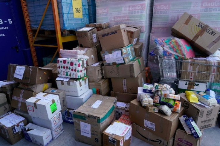 Supplies for civilians are stored in Zaporizhzhya prior to their shipment by convoy to the besieged city of Mariupol