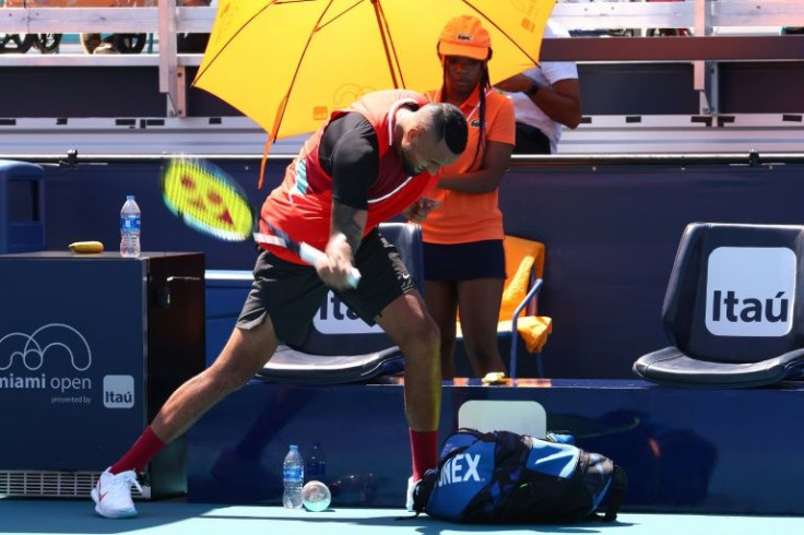 Australia's Nick Kyrgios slams his racquet in his match against Italian Jannik Sinner at the Miami Open ATP and WTA hard court tennis tournament