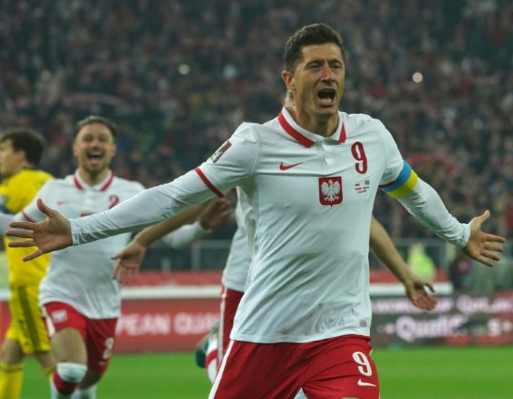 Robert Lewandowski scored a penalty which put Poland on the way to victory over Sweden and a place in Qatar