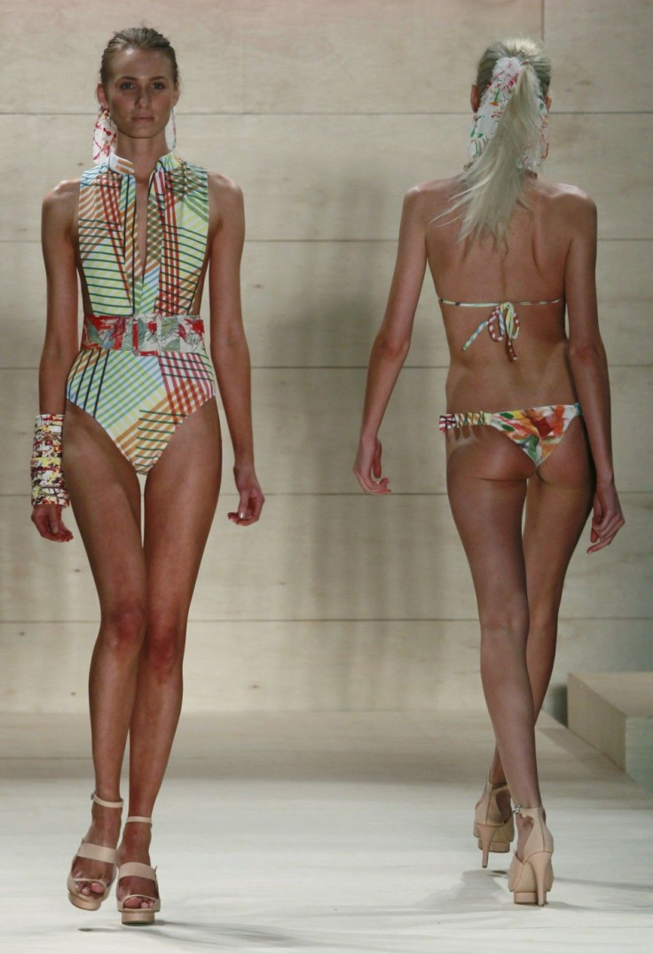 Models present creations from Movimento&#039;s Summer 2012 collection during Sao Paulo Fashion week in Sao Paulo