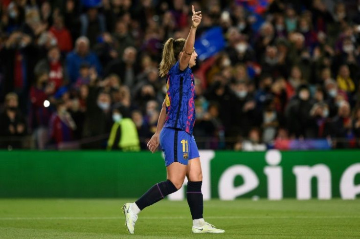 Barcelona's Spanish midfielder Alexia Putellas celebrates scoring her team's fourth goal against Real Madrid.