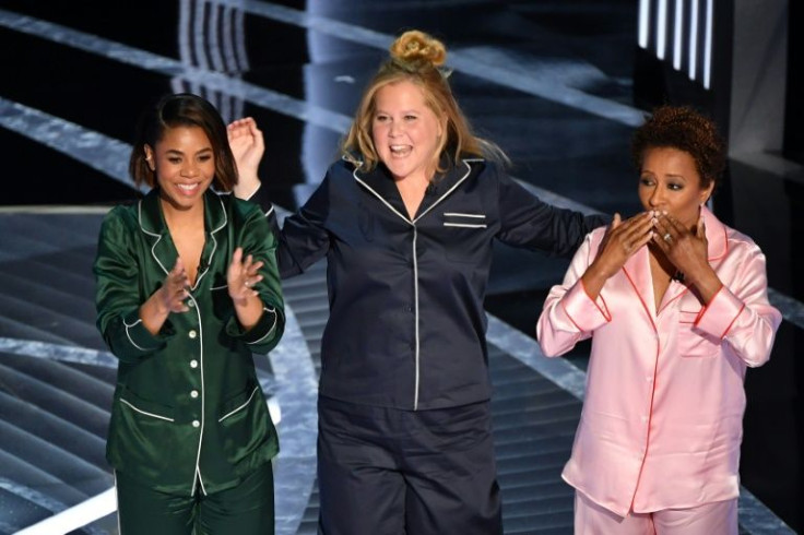 (From L-R) Regina Hall, Amy Schumer and Wanda Sykes have been praised for their performances as hosts of the Oscars