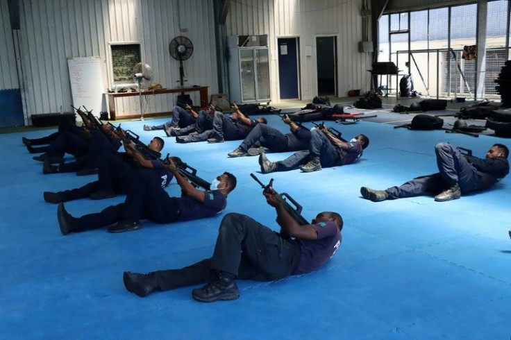 Chinese police officers train members of the Royal Solomon Islands Police Force