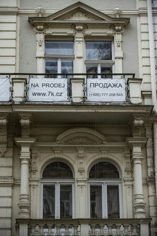 Many home and hotel owners -- largely Russian -- have decided to sell their properties because of the pandemic and war in Ukraine. Above there is a 'For Sale' sign.