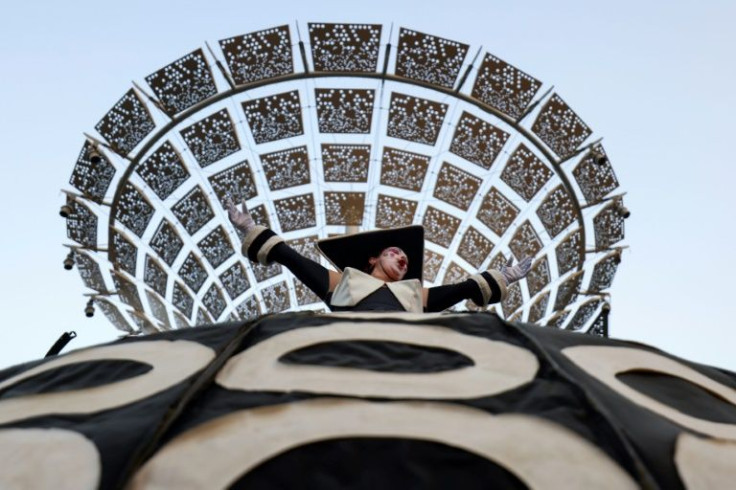 A member of a European troupe performs at the exhibition on March 25, 2022