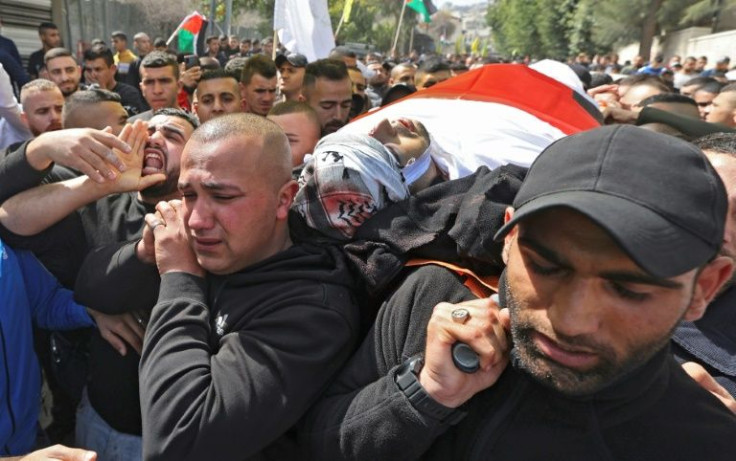 Palestinian mourners attend the funeral of one of the men killed during an Israeli raid in Jenin in the occupied West Bank