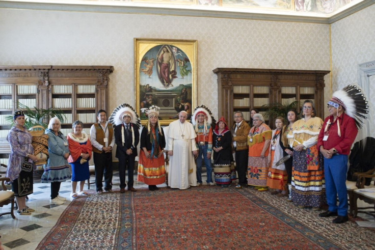 Indigenous delegates from Canada's First Nations pose for a photo with Pope Francis during a meeting at the Vatican, March 31, 2022. Vatican Media/ÂHandout via REUTERS