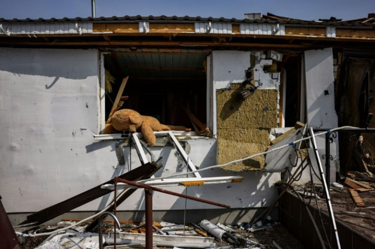 A teddy bear is pictured in a destroyed house in the outskirts of Kyiv, on March 31, 2022, amid Russian invasion of Ukraine