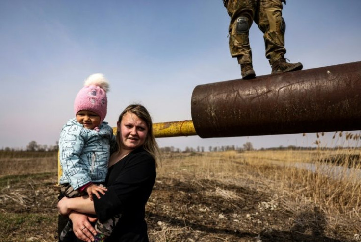 Karina Tkachenko says they had decided to leave because the Russians had occupied the village next to hers