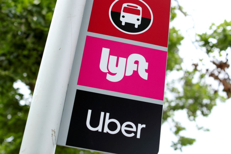 The logos of Lyft and Uber are displayed in San Diego