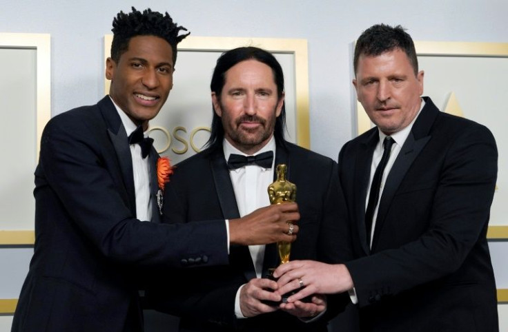 (L-R) Jon Batiste, Trent Reznor and Atticus Ross won the Oscar in 2021 for best original score for Pixar animated film "Soul"