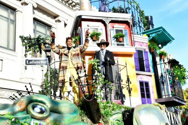 Jon Batiste (L) appears on the Louisiana Office of Tourism float during New York's annual Thanksgiving parade on November 25, 2021