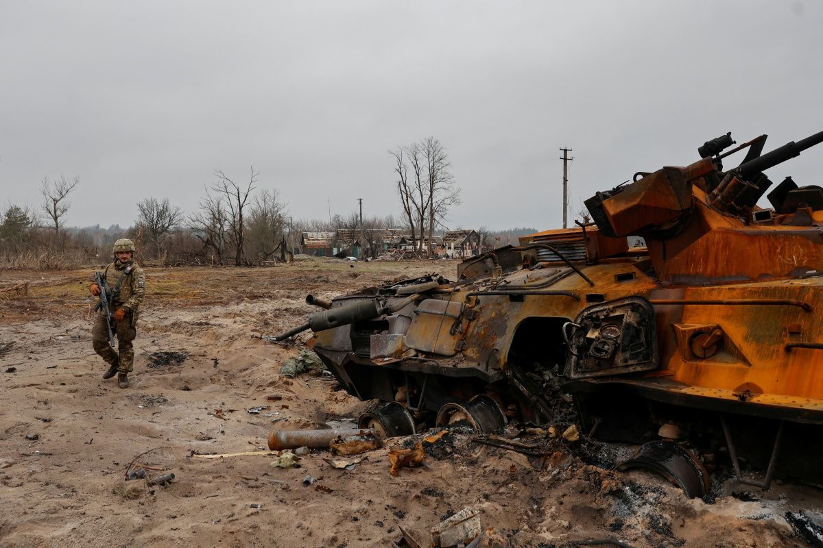 Bodies And Tanks Mark Path As Russia Moves Troops From Kyiv