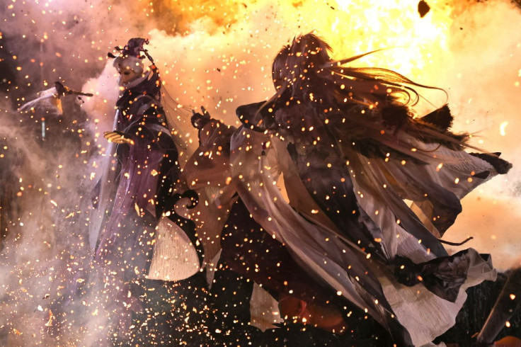 Two Pili puppet characters battle each other, with real fire as a special effect, during a demonstration at their filming studio in Yunlin, Taiwan, February 18, 2022.