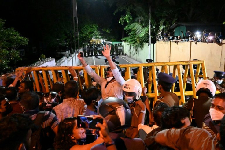 Videos shared on social media showed men and women shouting "lunatic, lunatic go home"