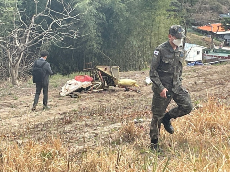 Debris of South Korean air force planes that collided mid-air during a training exercise, is seen in Sacheon, South Korea, April 1, 2022.  Yonhap via REUTERS   