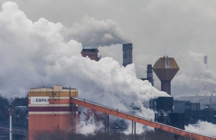 Logos of EVRAZ group are seen on buildings of Nizhny Tagil metallurgical combinate NTMK, in Nizhny Tagil, Russia November 21, 2021.