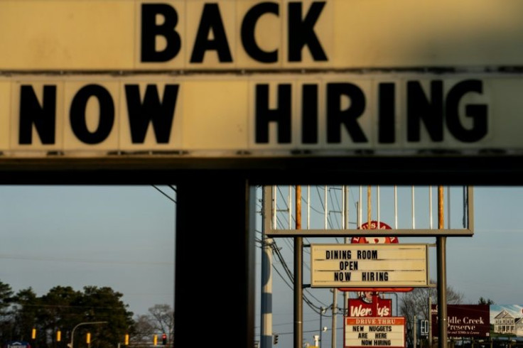 Businesses across the United States hired hundreds of thousands of workers in March, bringing key metrics of labor market health closer to where they were before the pandemic