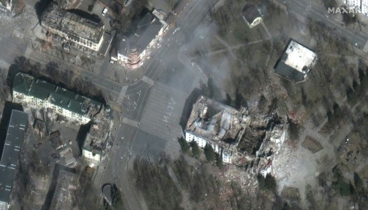 Satellite images show the word 'deti' ('children' in Russian) had been painted in large white letters in front and behind the Mariupol theatre