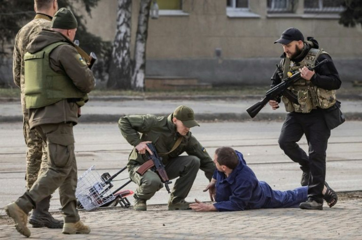 With the Russian army parked at Kharkiv's gates, the aim of the Spetsnaz is to try and 'maintain order and protect the population' amid the chaos