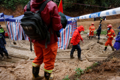 Rescue workers work at the site where a China Eastern Airlines Boeing 737-800 plane flying from Kunming to Guangzhou crashed, in Wuzhou, Guangxi Zhuang Autonomous Region, China March 24, 2022. 