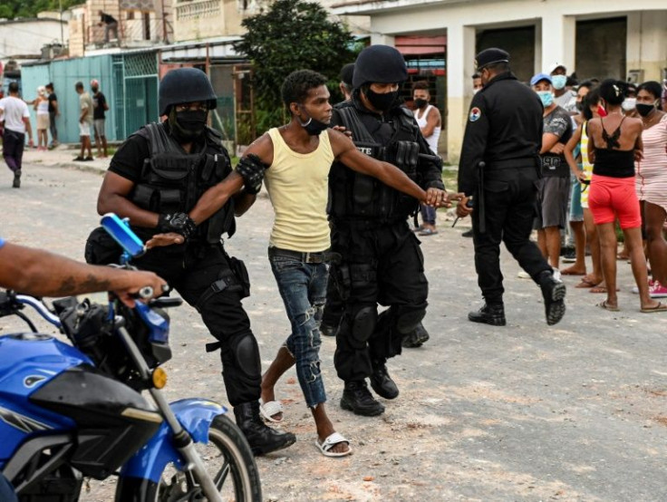 A man is arrested in the Arroyo Naranjo area of Havana during anti-government protests in July 2021