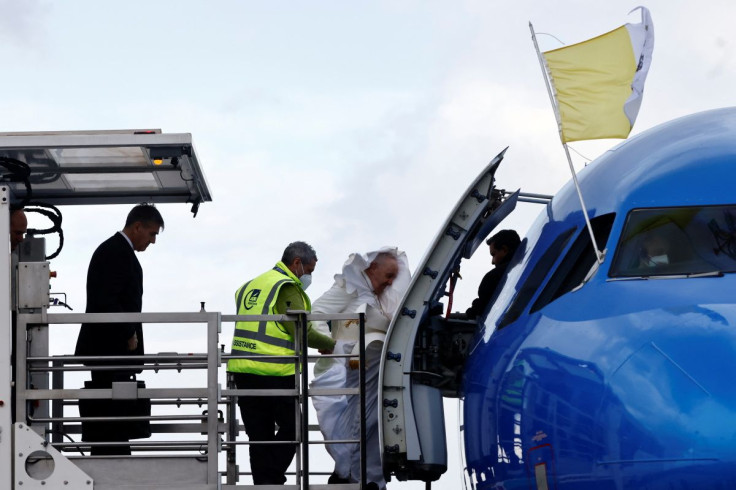Pope Francis arrives to board a plane for his visit to Malta, at Leonardo da Vinci-Fiumicino Airport in Rome, Italy, April 2, 2022.