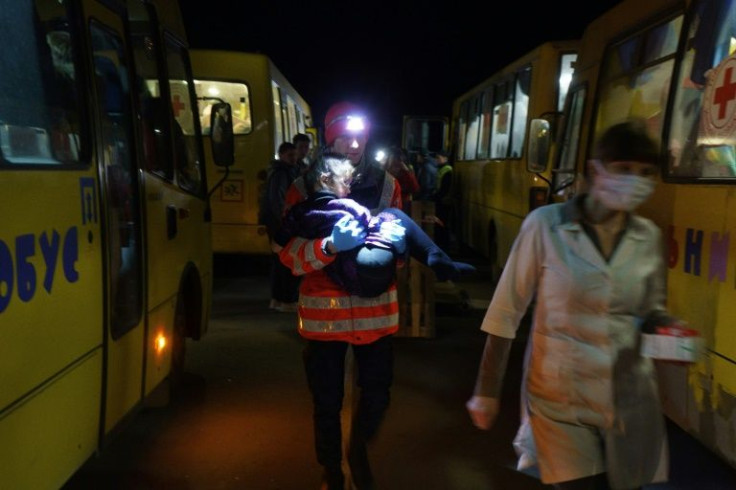 Dozens of buses carrying Mariupol residents who had escaped the city arrived in Zaporizhzhia, 200 kilometres (120 miles) to the northwest