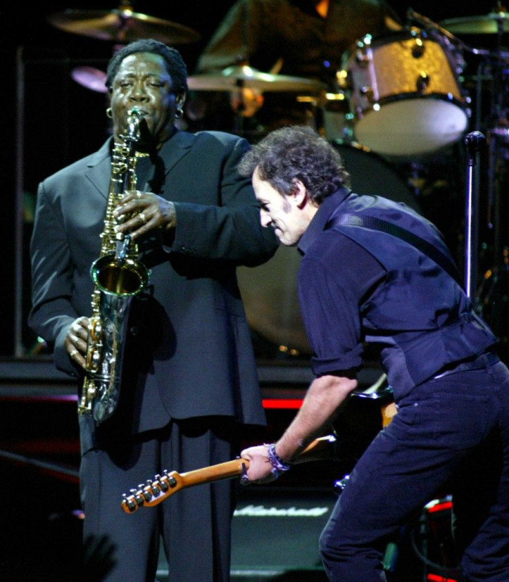 SINGER BRUCE SPRINGSTEEN WITH CLEMONS DURING CONCERT IN MIAMI.