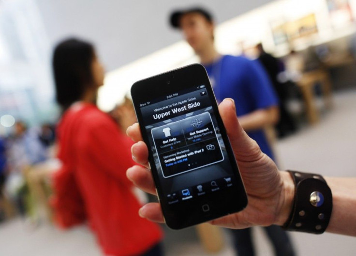 A new in-store app is seen on an iPhone at the Apple store in New York