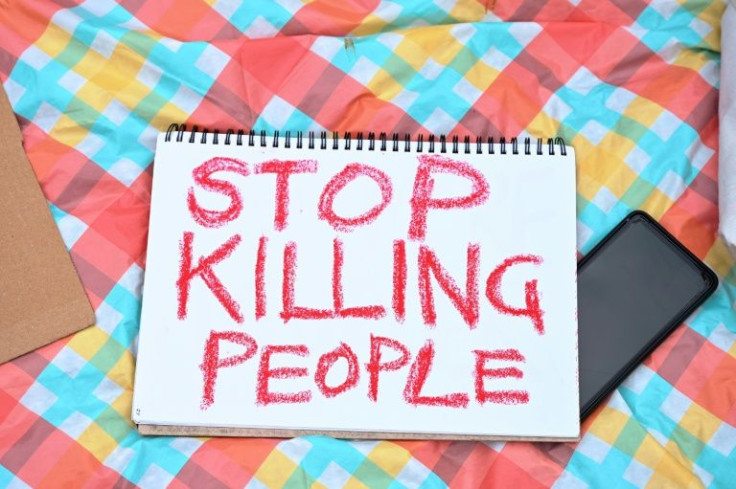 Hundreds of protesters in Singapore staged a rare demonstration against the death penalty