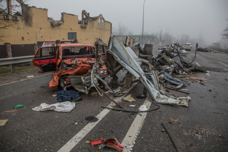 Squashed civilian cars are seen on a street, as Russia's attack on Ukraine continues, in the town of Bucha, in Kyiv region, Ukraine April 1, 2022.