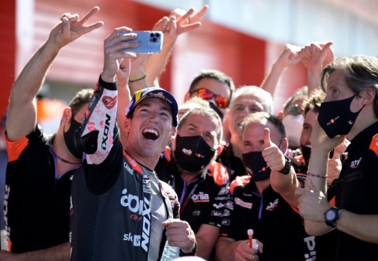Team work: Aleix Espargaro takes a selfie with his Aprilia team after winning the Argentina Grand Prix